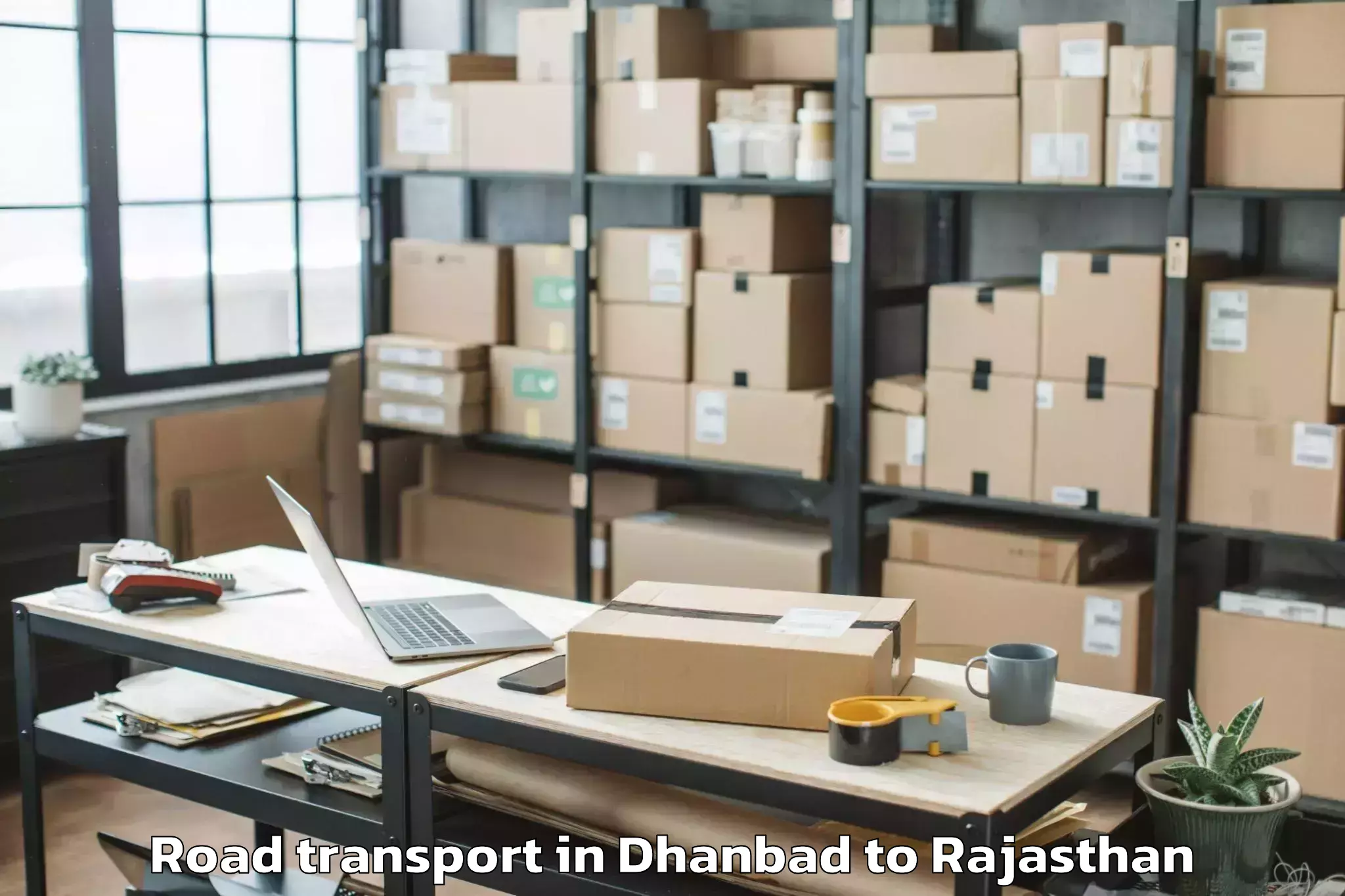 Book Dhanbad to Kumher Road Transport Online